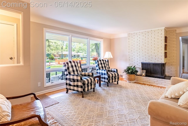 28441 Westerleigh Rd, Farmington, MI 48334 - living area featuring a fireplace and baseboards