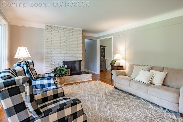 28441 Westerleigh Rd, Farmington, MI 48334 - living area with wood finished floors and a brick fireplace