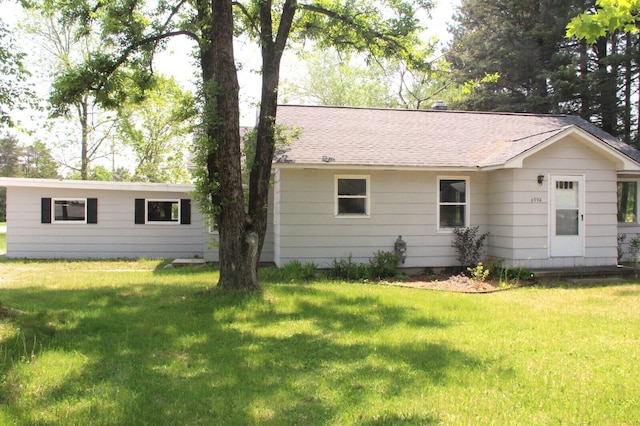 6994 E 34th Rd, Cadillac, MI 49601 - single story home with a front lawn and a shingled roof