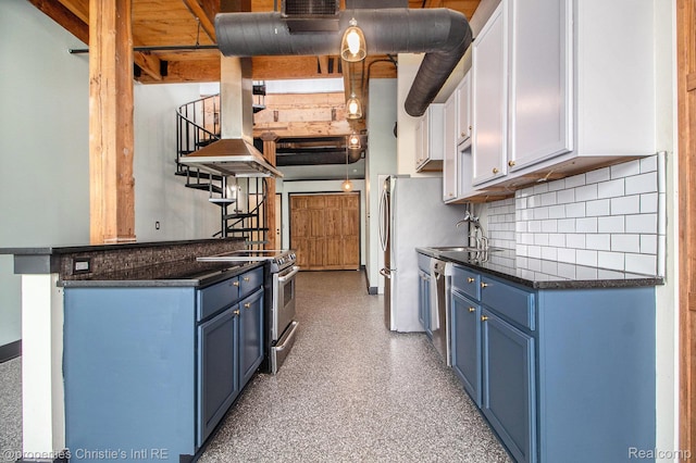 6533 E Jefferson Unit 427, Detroit, MI 48207 - kitchen featuring blue cabinetry, appliances with stainless steel finishes, dark countertops, decorative backsplash, and white cabinets