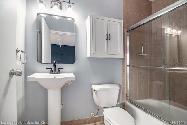 6533 E Jefferson Unit 427, Detroit, MI 48207 - full bathroom featuring toilet and enclosed tub / shower combo