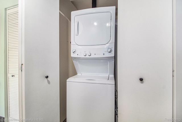 6533 E Jefferson Unit 427, Detroit, MI 48207 - washroom with estacked washer and dryer