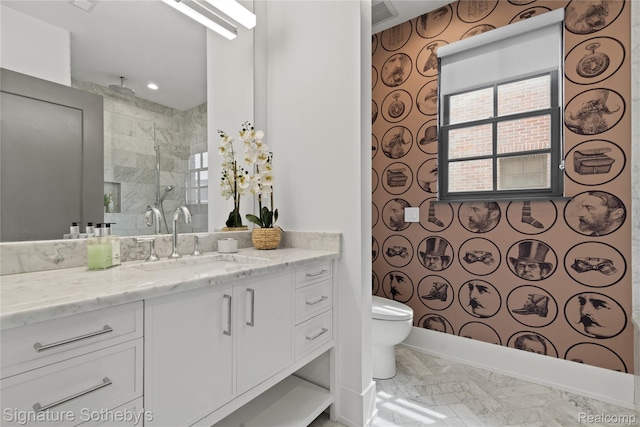 932 W 11 Mile Rd, Royal Oak, MI 48067 - bathroom featuring vanity, toilet, a walk in shower, and marble finish flooring