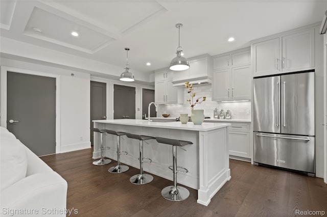 932 W 11 Mile Rd, Royal Oak, MI 48067 - kitchen with high end refrigerator, recessed lighting, light countertops, a sink, and decorative backsplash