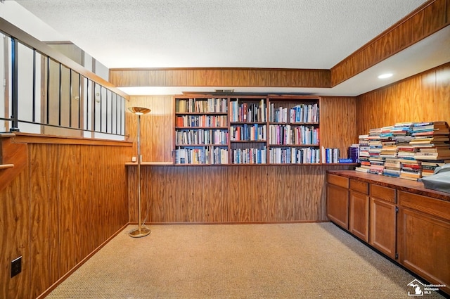 7658 Salter Ct, Temperance, MI 48182 - unfurnished office featuring wood walls, carpet, and a textured ceiling