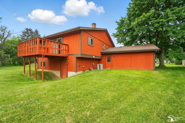 7658 Salter Ct, Temperance, MI 48182 - back of house featuring a yard, a deck, and a chimney