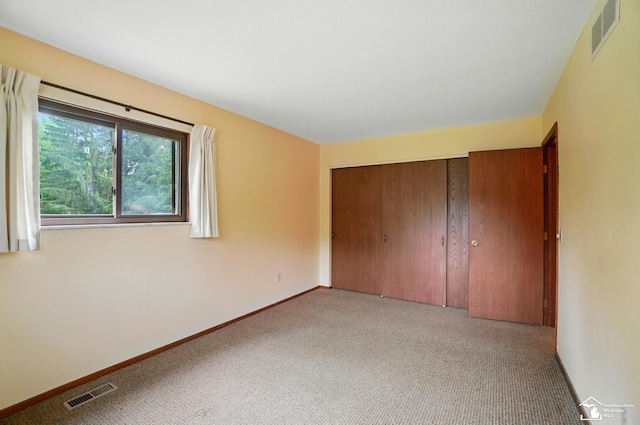 7658 Salter Ct, Temperance, MI 48182 - unfurnished bedroom featuring light colored carpet and a closet