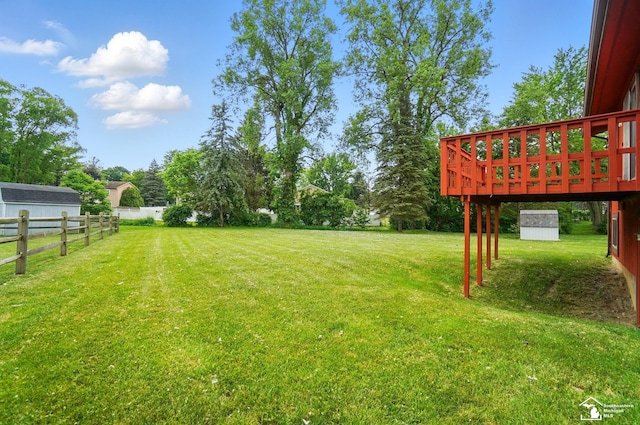 7658 Salter Ct, Temperance, MI 48182 - view of yard with a storage unit and a wooden deck