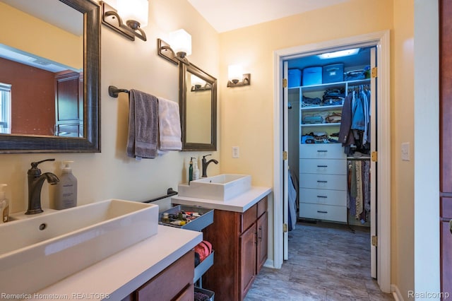 400 Cherry Grove Rd, Canton, MI 48188 - bathroom with vanity and a walk in closet