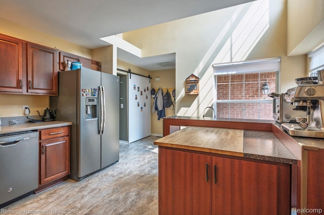 400 Cherry Grove Rd, Canton, MI 48188 - kitchen with stainless steel appliances and a barn door