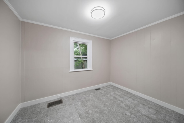 164 Cross St, Michigan Center, MI 49254 - empty room with carpet, crown molding, and baseboards