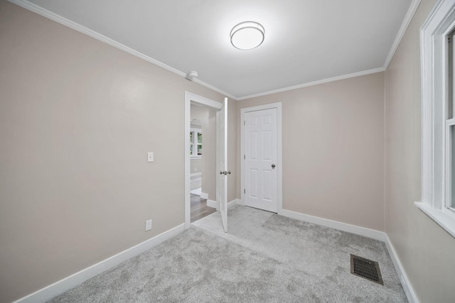 164 Cross St, Michigan Center, MI 49254 - unfurnished bedroom with carpet flooring, crown molding, and baseboards