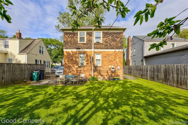 1722 W Farnum Ave, Royal Oak, MI 48067 - back of house featuring brick siding and a patio