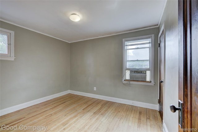 1722 W Farnum Ave, Royal Oak, MI 48067 - empty room featuring hardwood / wood-style floors, baseboards, ornamental molding, and cooling unit