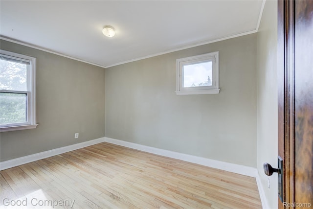 1722 W Farnum Ave, Royal Oak, MI 48067 - spare room with wood finished floors, ornamental molding, and baseboards