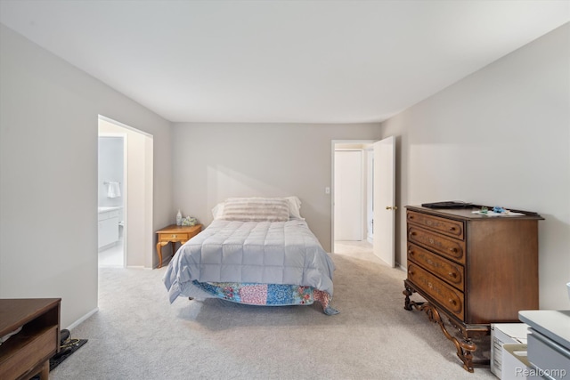 29865 Indian Trl Unit 107, Farmington Hills, MI 48331 - bedroom featuring light carpet and ensuite bath