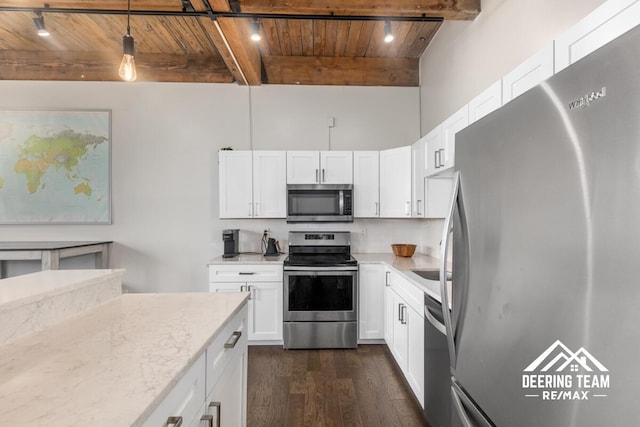 940 Monroe Ave NW Unit 335, Grand Rapids, MI 49503 - kitchen featuring appliances with stainless steel finishes, wooden ceiling with exposed beams, dark wood-type flooring, light stone countertops, and white cabinetry