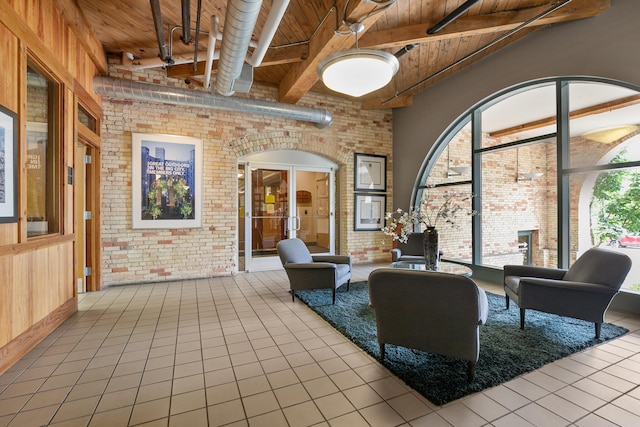 940 Monroe Ave NW Unit 335, Grand Rapids, MI 49503 - lobby featuring wood ceiling with exposed beams and brick wall