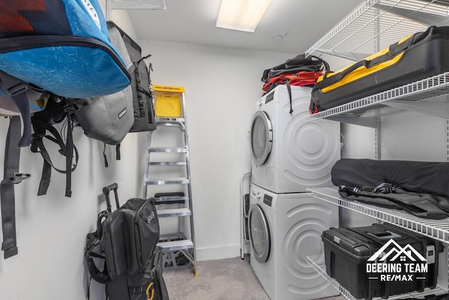 940 Monroe Ave NW Unit 335, Grand Rapids, MI 49503 - washroom with stacked washer / dryer