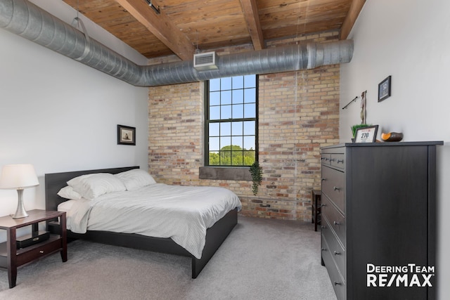 940 Monroe Ave NW Unit 335, Grand Rapids, MI 49503 - bedroom with a wood ceiling with exposed beams, brick wall, and carpet flooring