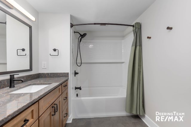 940 Monroe Ave NW Unit 335, Grand Rapids, MI 49503 - full bathroom featuring shower / tub combo, vanity, and tile patterned floors