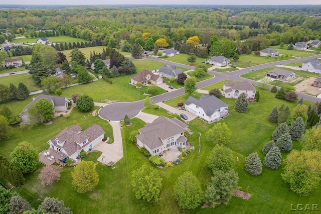 1269 Scott Ridge Dr, Adrian, MI 49221 - aerial view of residential area with a heavily wooded area