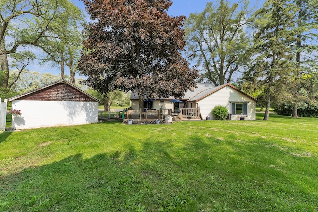2006 W Rose Center Rd, Holly, MI 48442 - view of grassy yard featuring a deck