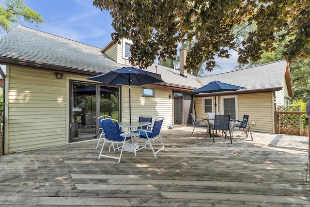 2006 W Rose Center Rd, Holly, MI 48442 - deck featuring outdoor dining space