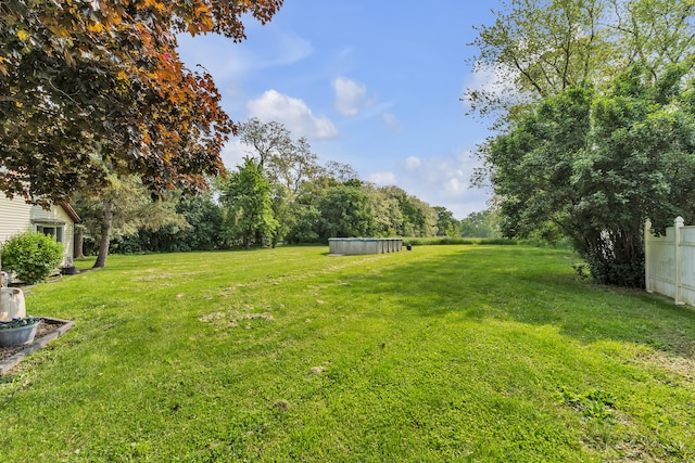 2006 W Rose Center Rd, Holly, MI 48442 - view of green lawn featuring an outdoor pool