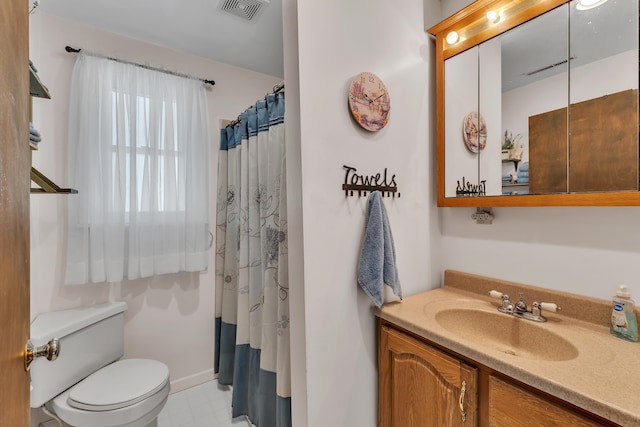 2006 W Rose Center Rd, Holly, MI 48442 - bathroom with vanity, toilet, tile patterned floors, and a shower with shower curtain