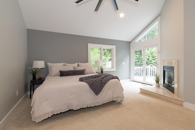 8562 W R Ave, Kalamazoo, MI 49009 - carpeted bedroom featuring access to outside, baseboards, a fireplace, high vaulted ceiling, and a ceiling fan
