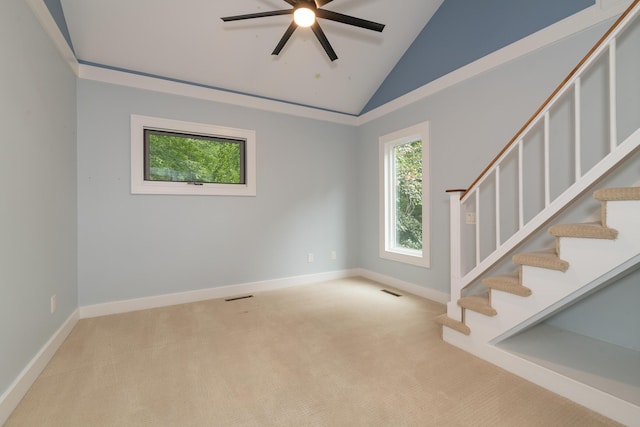 8562 W R Ave, Kalamazoo, MI 49009 - unfurnished room with a ceiling fan, vaulted ceiling, carpet floors, stairs, and baseboards