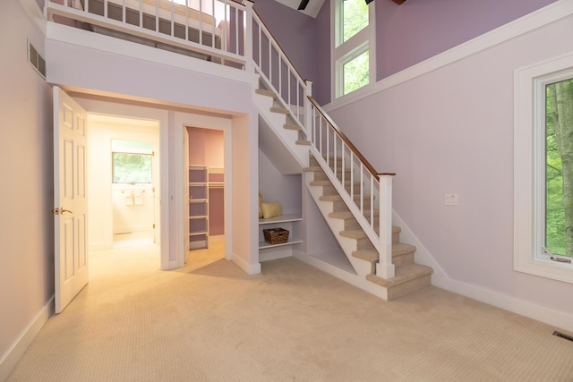 8562 W R Ave, Kalamazoo, MI 49009 - stairway featuring carpet and baseboards