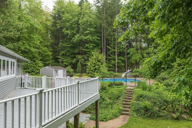 8562 W R Ave, Kalamazoo, MI 49009 - view of yard featuring a wooden deck and stairway