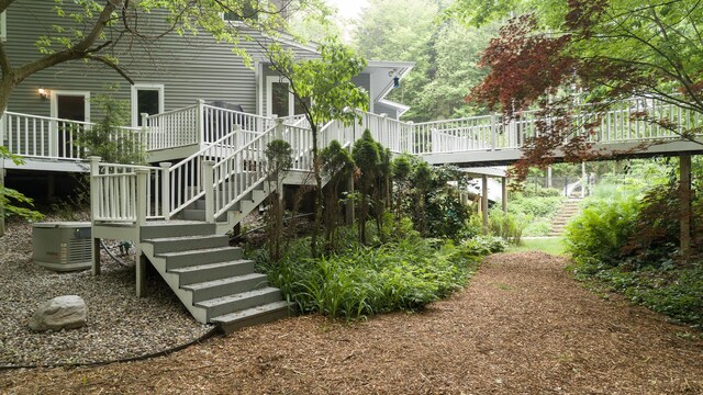 8562 W R Ave, Kalamazoo, MI 49009 - rear view of property featuring stairway and a wooden deck