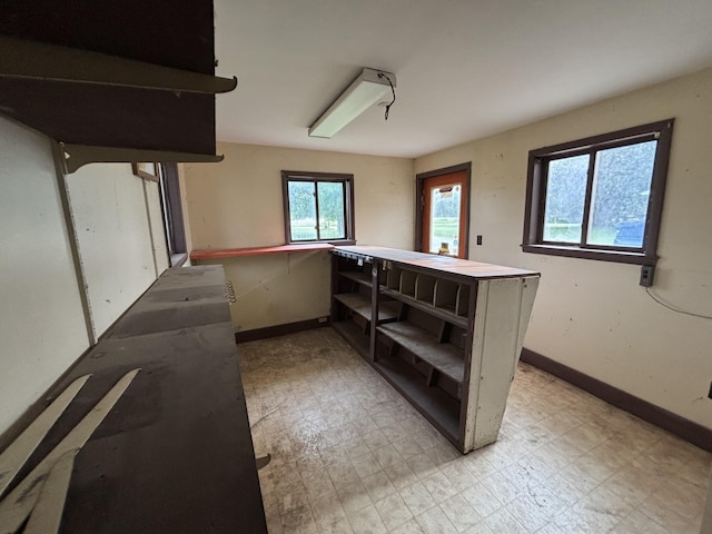 15522 Kimball Rd, Trufant, MI 49347 - basement featuring baseboards and light flooring
