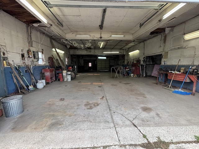 15522 Kimball Rd, Trufant, MI 49347 - garage featuring a workshop area