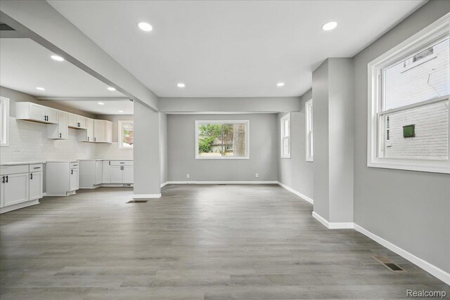 18287 Santa Rosa Dr, Dearborn, MI 48221 - unfurnished living room with baseboards, recessed lighting, and wood finished floors