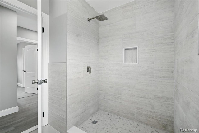 18287 Santa Rosa Dr, Dearborn, MI 48221 - full bathroom with a tile shower and baseboards
