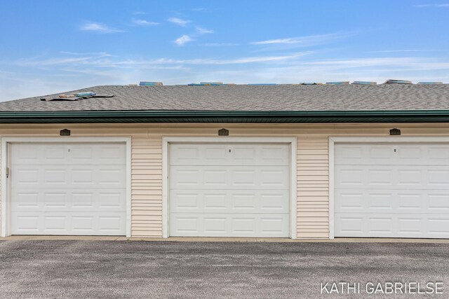 5869 Crosswinds Dr Unit 21, Norton Shores, MI 49444 - view of garage