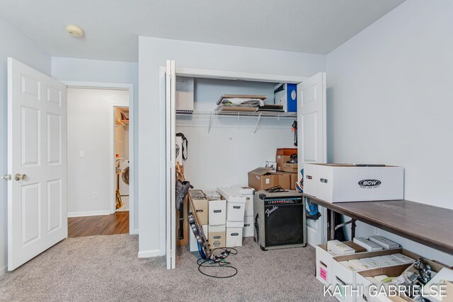 5869 Crosswinds Dr Unit 21, Norton Shores, MI 49444 - bedroom featuring carpet floors and a closet