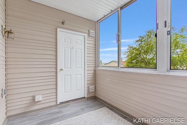 5869 Crosswinds Dr Unit 21, Norton Shores, MI 49444 - unfurnished sunroom with healthy amount of natural light