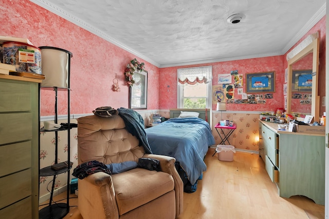 122 N Robinson St, Schoolcraft, MI 49087 - bedroom featuring wallpapered walls, wood finished floors, crown molding, and baseboards