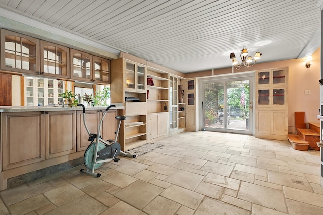 122 N Robinson St, Schoolcraft, MI 49087 - unfurnished sunroom with a chandelier