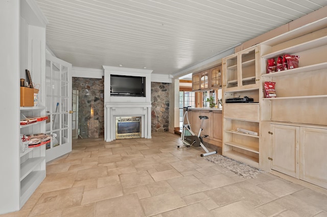 122 N Robinson St, Schoolcraft, MI 49087 - interior space with stone tile flooring and a glass covered fireplace