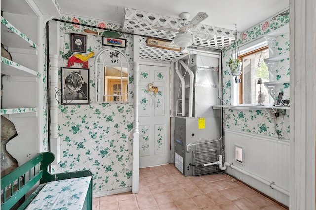 122 N Robinson St, Schoolcraft, MI 49087 - bathroom with wallpapered walls, a wainscoted wall, ceiling fan, and tile patterned floors