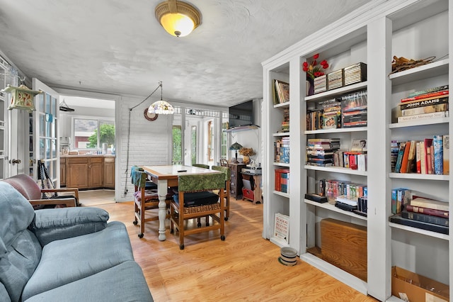 122 N Robinson St, Schoolcraft, MI 49087 - dining room featuring light wood-style floors and french doors
