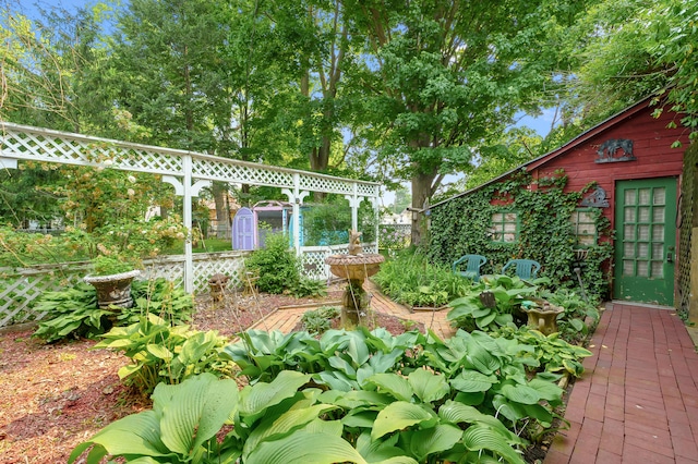 122 N Robinson St, Schoolcraft, MI 49087 - view of yard featuring a shed