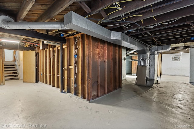 4387 Pingree St, Detroit, MI 48204 - unfinished basement featuring heating unit and stairway