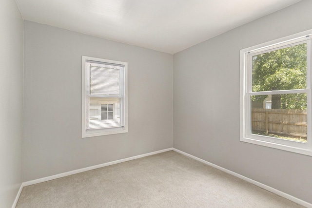 488 Roberts St, Muskegon, MI 49442 - unfurnished room featuring carpet floors and baseboards
